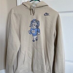 Nike Tan Hoodie with Blue Mascot Design